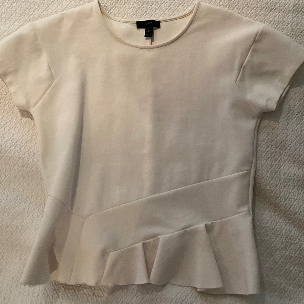 White peplum top